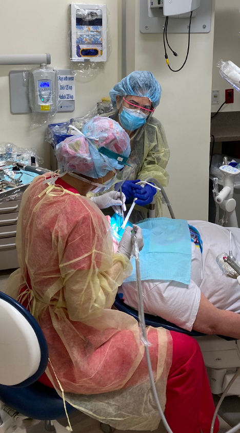 Dr. Debora Ayres, 1st year AEGD resident (left), and Jessica Ortiz, dental assistant (right)