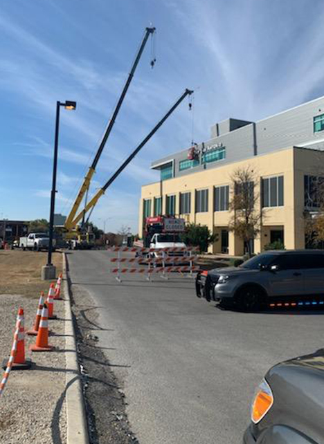 Installation crews working at the Center for Oral Health Care and Research.