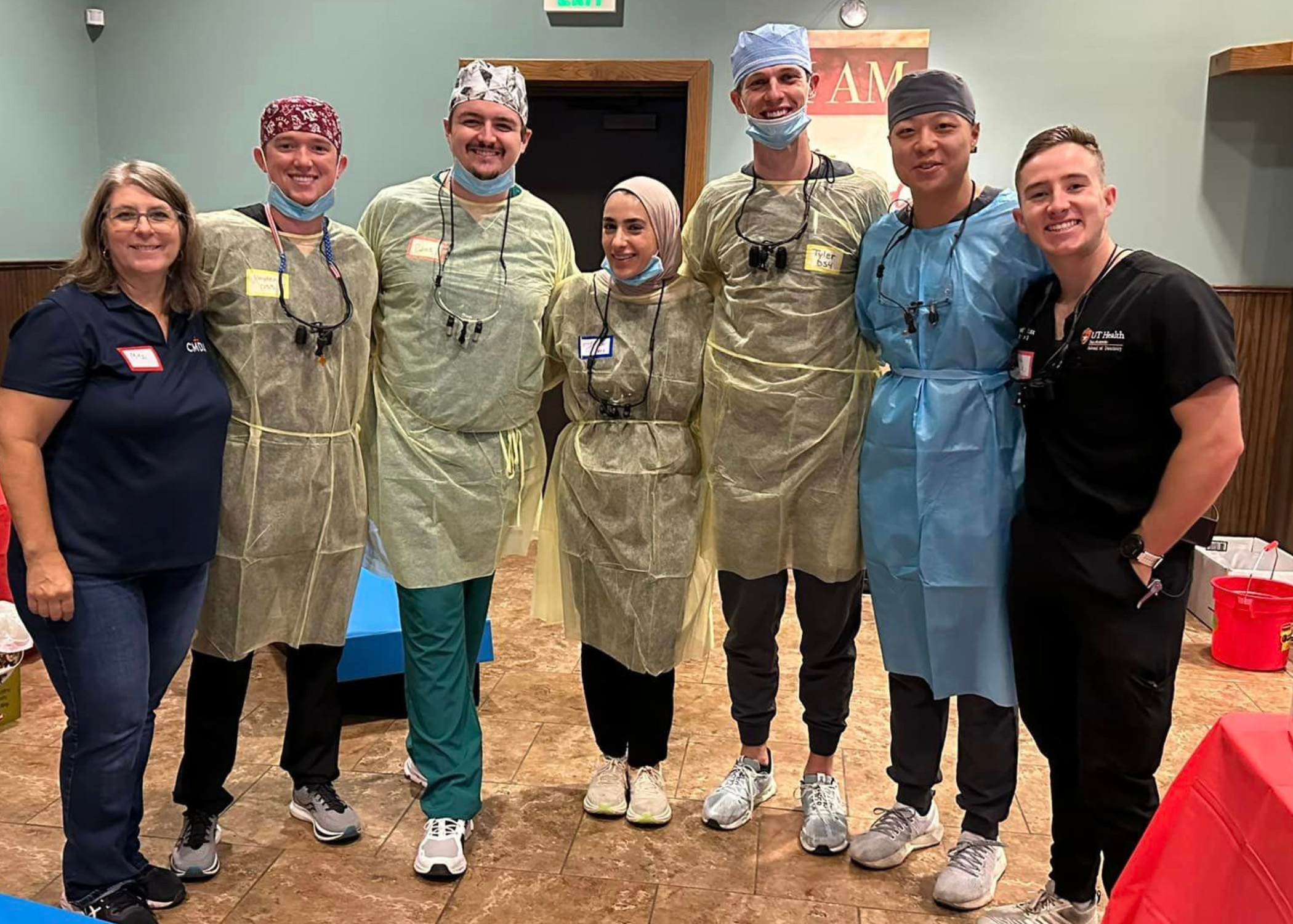 Volunteers and UT Health San Antonio School of Dentistry dental students at a recent Communities Under the Bridge event.