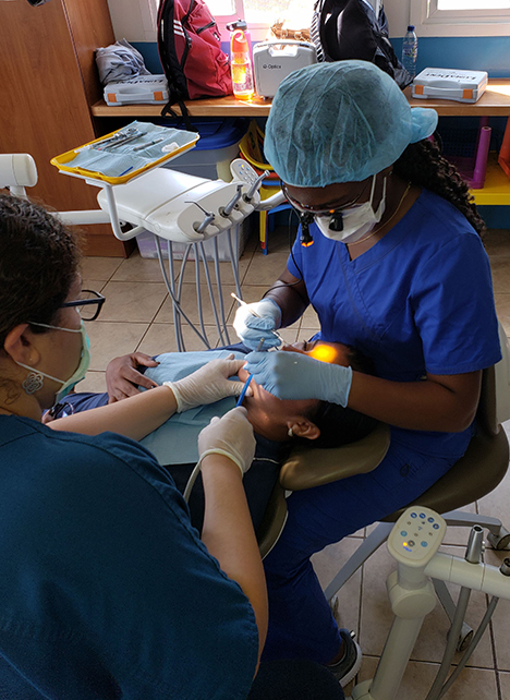 Dr. Taylor Reece caring for a Peronia patient.