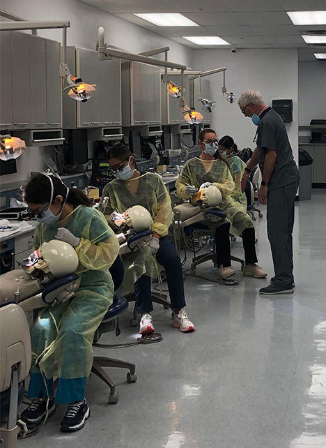 Dr. Kevin Gureckis instructs a student during an operative session of the HCOE's LEAD 5 program.  This group is part of the study being conducted by Sabrina Chavez.