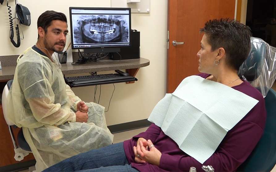 doctor talking to patient