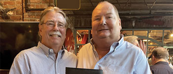 Kevin J. Donly (left), DDS, MS with Timothy B. Henson, DMD
