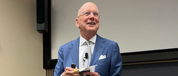 Photo of Dr. Henrich at the President's Forum