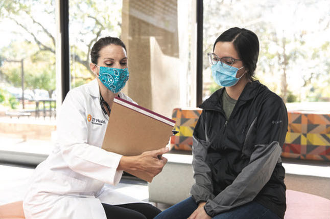 Doctor discussing results with medical fellow