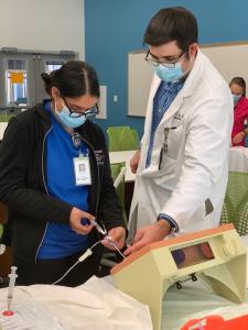 UT Health Students in hospital setting learning