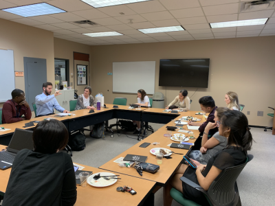 An alumni speaker talks to the MD/MPH fourth-year cohort.